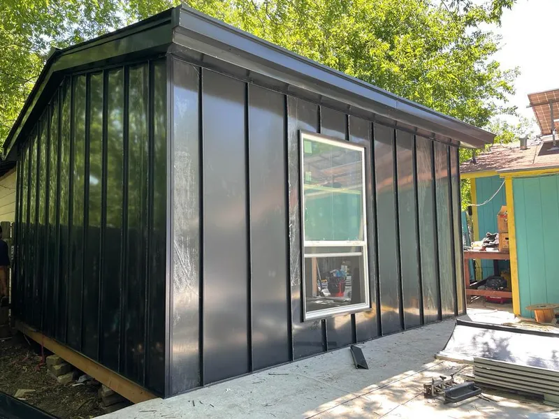 Black standing seam metal wall panels for Roof Inspection in Gilford