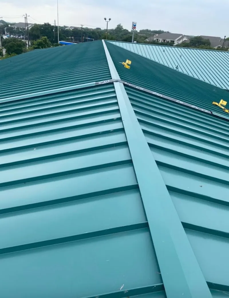 Green commercial metal roof ridge and valley for Metal Roof Repair in Gilford